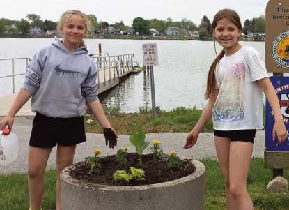 Beautification committee and volunteers spruce up area